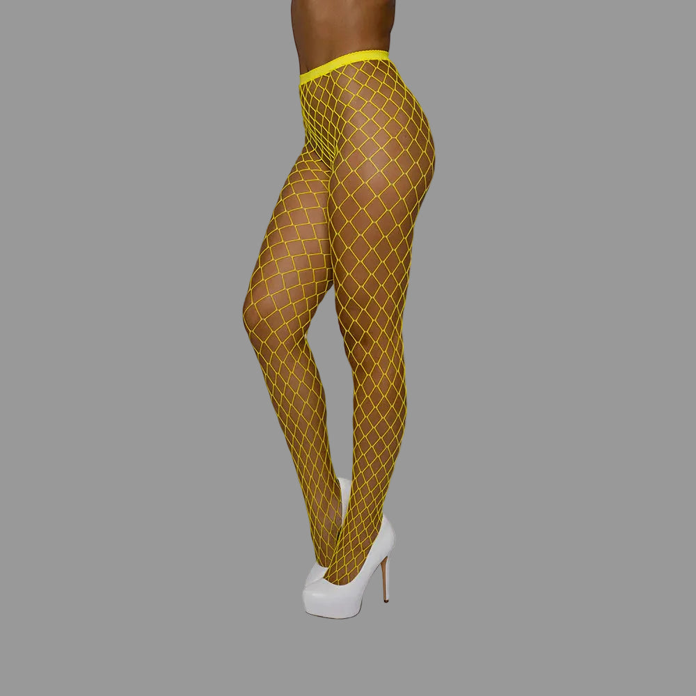 Yellow fishnet stockings worn by a person on a white background